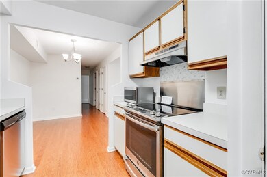 Kitchen with appliances with stainless steel finis