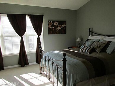 Master Bedroom. Master Bedroom has a bank of windows.  Large walk in closet