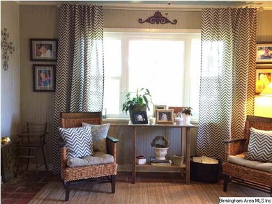 Love this cozy sunroom!
