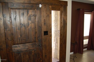 CUSTOM KNOTTY ALDER ENTRY DOOR