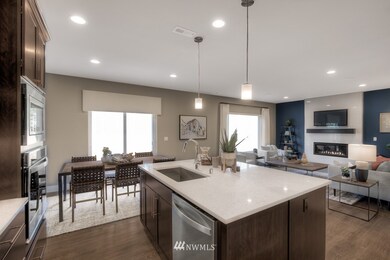 Photo of Newhalem 2 D previously built model home is used for representation purposes. Orientation, colors, design elements, and finish details will vary.
