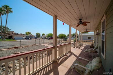 Balcony featuring ceiling fan