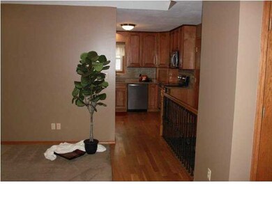 View from Living Room to Kitchen and Basement Stai