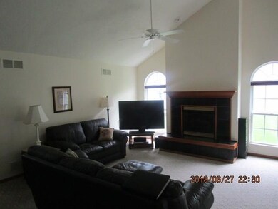 SPACIOUS GREAT ROOM FEATURES A GAS BURNING FIREPLA
