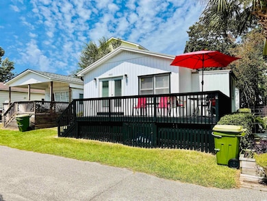 Exterior space featuring a yard