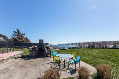 A casual terrace area and 'original' firepit are o