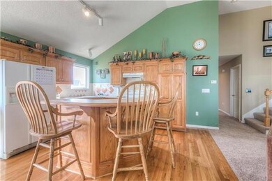 Kitchen with hardwood floors.