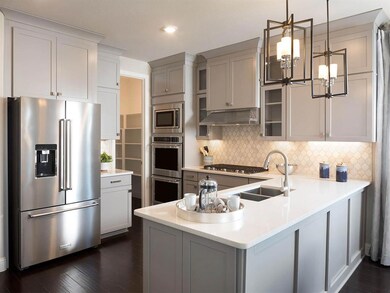 Photo is not of the actual home, but is an inspirational photo of builder’s model home and may depict options, furnishings, and/or decorator features that are not included