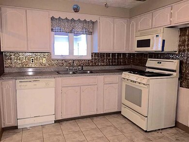 Kitchen. Backsplash, open to dining room