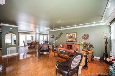 View of the living and dining rooms from just insi