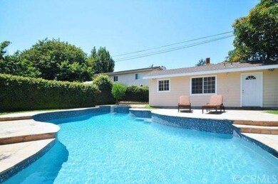 Resurfaced and tiled sparkling pool  