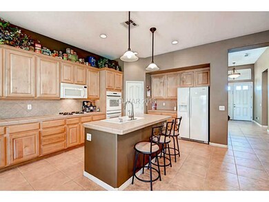 Kitchen. Kitchen island and upgraded lighting