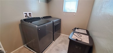 Laundry area with separate washer and dryer