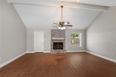 Living room with wood burning Fireplace.