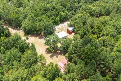 Arial view of MH, outbuilding and barn.