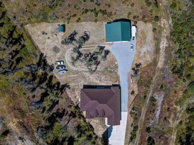 Drone shot looking down at the property