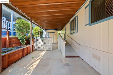 View of patio / terrace featuring an outbuilding