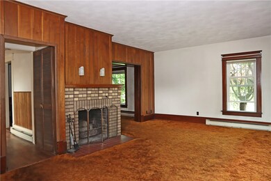 Living Room with Wood Burning Fireplace