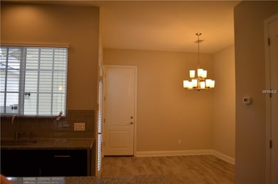 Dining area just off the kitchen, leading to both 
