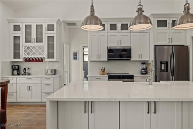 Kitchen featuring appliances with stainless steel