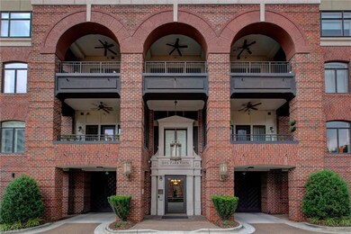 Close-up view of building entry into One Park Vista.