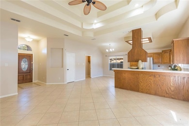 An inviting foyer, with a decorative accent tile flooring design, greets your family and friends. The open concept floor design allows endless furniture placement possibilities.