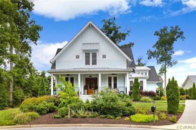 Modern inspired farmhouse featuring covered porch