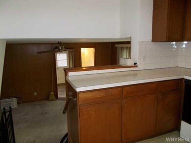 Family Room kitchen over look into family room