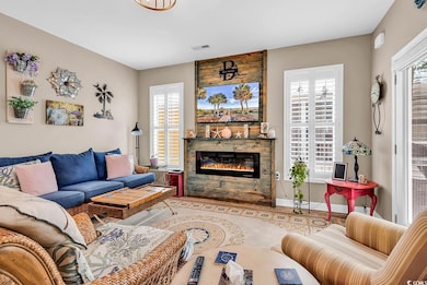 Living room with visible vents and a glass covered