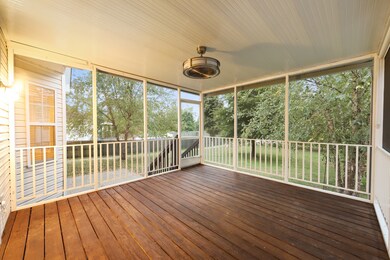 NEW Screened in Porch making this the 3rd living area of the home that overlooks the huge backyard with Mature Trees, 12x16 Shed, Patio, and 2 Gardens. Tons of privacy! 