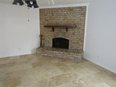 Unfurnished living room featuring crown molding, c