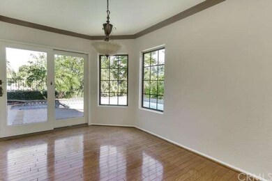 Light fills the dining area and sliding glass door