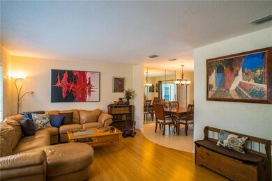 Living/Dining with Bamboo flooring and tile floori