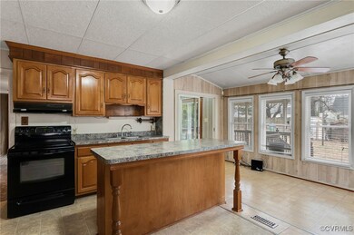 Gourmet Eat In Kitchen featuring Custom Cabinets /