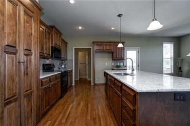 Beautiful stained cabinets and hardwood floors!