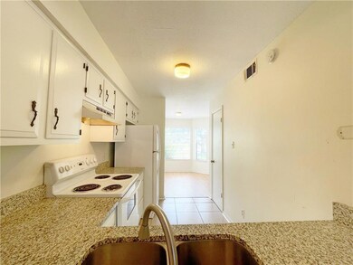 Unit 810: View of Kitchen through serving window