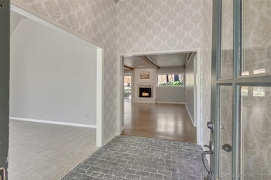 Entryway, formal dining on left, living room strai