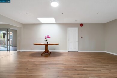 Great Room with door to the hallway of 2 bedrooms