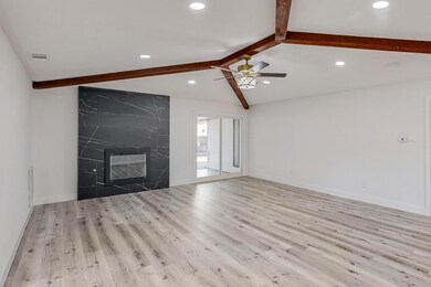 Unfurnished living room with light hardwood / wood