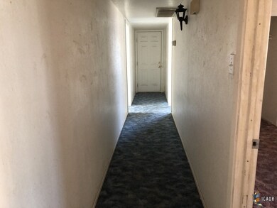 HALLWAY TO REAR DOOR