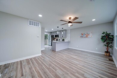 Open and Bright Living/Dining Area!