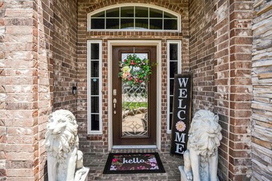 Welcome to your fabulous home! A stone and brick facade lends to great curb appeal.