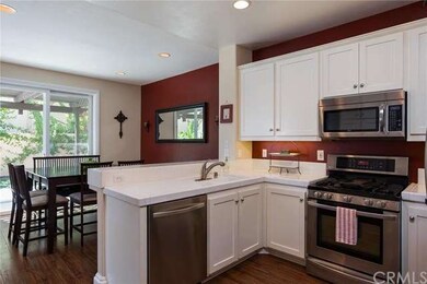 Kitchen features stainless steal appliances and lo