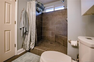 Master Bathroom with oversized tile-surround showe