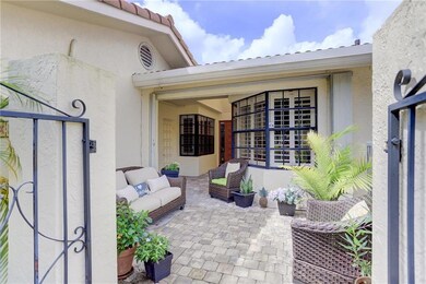 Wonderful paver courtyard entry.