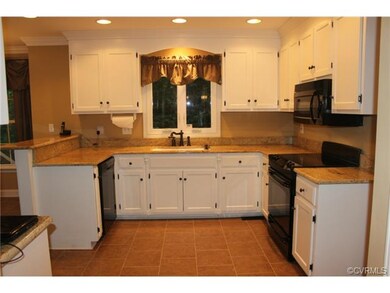 Beautifully updated kitchen with granite counters,