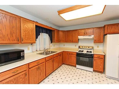 Kitchen has lots of storage and appliances stay.