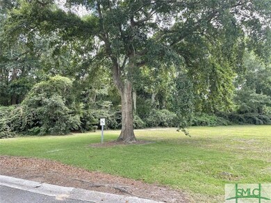 Street view of open Greenspace next door.