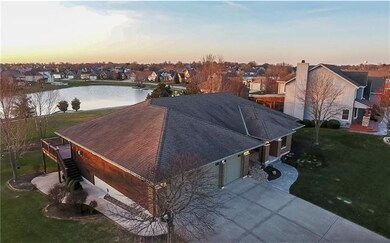 Aerial view of house and water