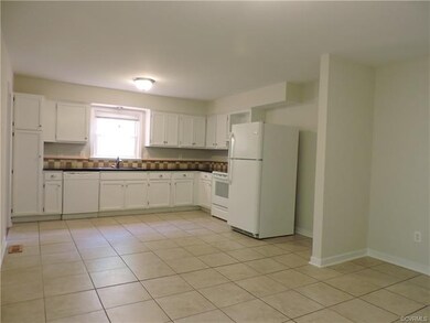 Large eat-in kitchen with granite-tile countertops